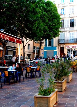 wide view of Place de Lenche public square with surrounding buildings in Marseille