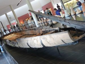 Gallo-Roman wooden barge displayed indoors at Arles Antique Museum