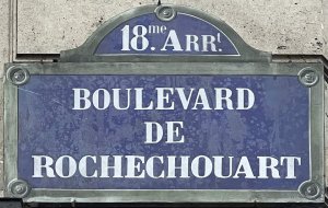 Street sign plaque for Boulevard Marguerite de Rochechouart in Paris