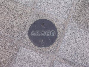 Arago medallion embedded in the pavement close to the Louvre Pyramid in Paris