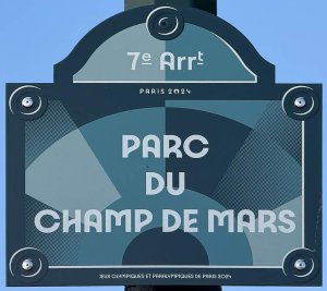 Plaque displaying the name of Champ de Mars park in Paris