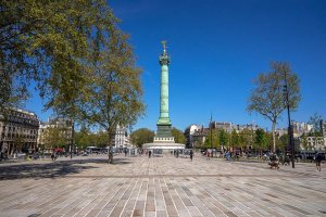 Wide view of Place de la Bastille square in Paris with surrounding architecture