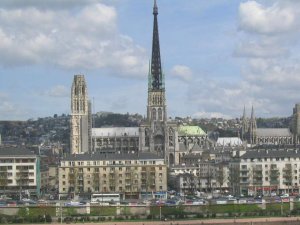 View of Rouen Cathedral gothic façade from the left riverbank