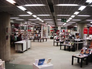 Interior view of the Bordeaux municipal library with bookshelves and reading tables