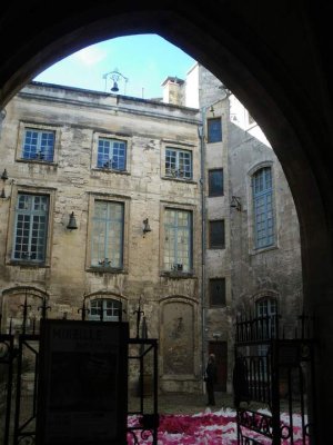 Inner courtyard of Palais du Roure with historic architecture in Avignon